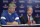 Indianapolis Colts coach Frank Reich listens as team owner Jim Irsay speaks following a news conference after the Colts' NFL preseason football game against the Chicago Bears, Saturday, Aug. 24, 2019, in Indianapolis. Colts quarterback Andrew Luck announced that he his retiring at age 29. (AP Photo/Michael Conroy)