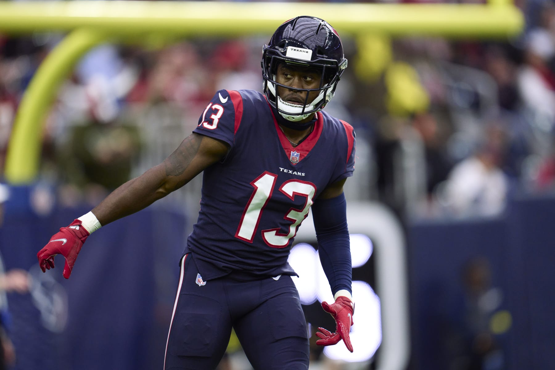 HOUSTON, TX - NOVEMBER 20: Brandin Cooks #13 of the Houston Texans lines up at the line of scrimmage against the Washington Commanders at NRG Stadium on November 20, 2022 in Houston, Texas. (Photo by Cooper Neill/Getty Images)