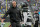 New York Jets head coach Robert Saleh congratulates New York Jets running back Ty Johnson (25) after Johnson scored a touchdown against the Chicago Bears during the third quarter of an NFL football game, Sunday, Nov. 27, 2022, in East Rutherford, N.J. (AP Photo/John Minchillo)