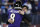 BALTIMORE, MARYLAND - JANUARY 11:  Head coach John Harbaugh of the Baltimore Ravens and quarterback Lamar Jackson #8 embrace prior to the AFC Divisional Playoff game against the Tennessee Titans at M&T Bank Stadium on January 11, 2020 in Baltimore, Maryland. (Photo by Todd Olszewski/Getty Images)