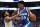 DALLAS, TX - NOVEMBER 29: Christian Wood #35 of the Dallas Mavericks is fouled by Anthony Lamb #40 of the Golden State Warriors in the first half at American Airlines Center on November 29, 2022 in Dallas, Texas. NOTE TO USER: User expressly acknowledges and agrees that, by downloading and or using this photograph, User is consenting to the terms and conditions of the Getty Images License Agreement. (Photo by Ron Jenkins/Getty Images)