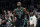 Boston Celtics' Jaylen Brown reacts after making the tying three-pointer during the second half of an NBA basketball game against the Miami Heat, Friday, Dec. 2, 2022, in Boston. (AP Photo/Michael Dwyer)