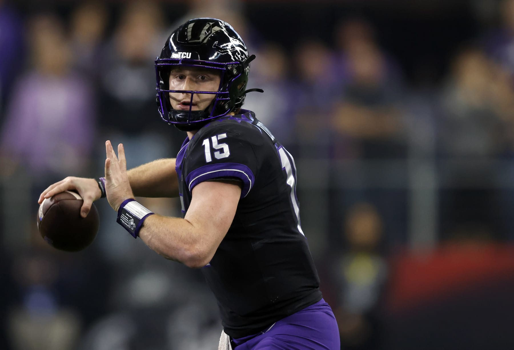 ARLINGTON, TX - DECEMBER 3: Max Duggan #15 of the TCU Horned Frogs looks to throw against the Kansas State Wildcats in the first half of the Big 12 Football Championship at AT&T Stadium on December 3, 2022 in Arlington, Texas. (Photo by Ron Jenkins/Getty Images)