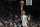 PORTLAND, OREGON - DECEMBER 04: Bennedict Mathurin #00 of the Indiana Pacers shoots the ball against Drew Eubanks #24 of the Portland Trail Blazers during the second half at Moda Center on December 04, 2022 in Portland, Oregon. NOTE TO USER: User expressly acknowledges and agrees that, by downloading and or using this photograph, User is consenting to the terms and conditions of the Getty Images License Agreement. (Photo by Soobum Im/Getty Images)