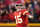 Kansas City Chiefs quarterback Patrick Mahomes looks to throw during the first half of an NFL football game against the Los Angeles Rams Sunday, Nov. 27, 2022, in Kansas City, Mo. (AP Photo/Charlie Riedel)