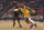 CLEVELAND, OH - DECEMBER 6: LeBron James #6 of the Los Angeles Lakers dribbles the ball during the game against the Cleveland Cavaliers on December 6, 2022 at Rocket Mortgage FieldHouse in Cleveland, Ohio. NOTE TO USER: User expressly acknowledges and agrees that, by downloading and/or using this Photograph, user is consenting to the terms and conditions of the Getty Images License Agreement. Mandatory Copyright Notice: Copyright 2022 NBAE (Photo by David Liam Kyle/NBAE via Getty Images)