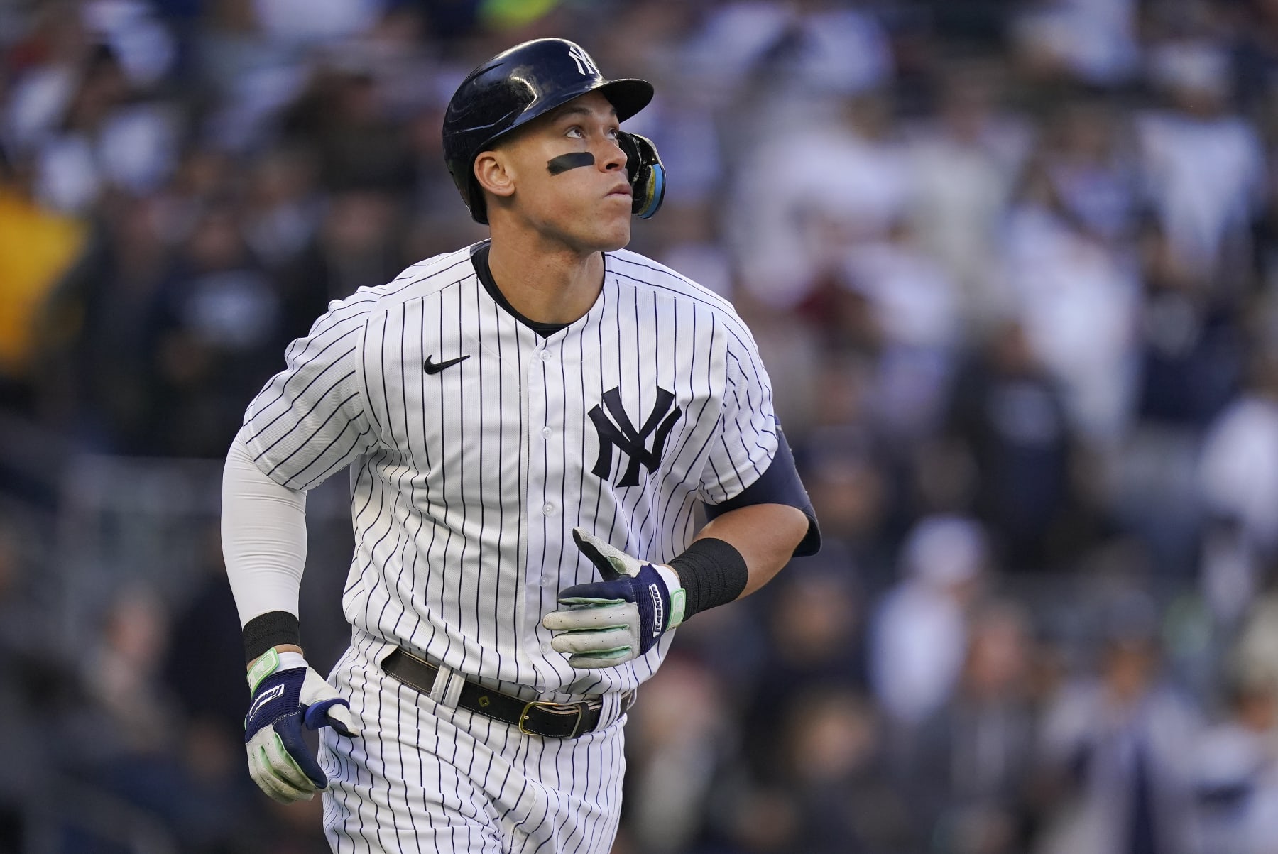 New York Yankees center fielder Aaron Judge watches his solo home run ball during the second inning of Game 5 of an American League Division baseball series against the Cleveland Guardians, Tuesday, Oct. 18, 2022, in New York. (AP Photo/Frank Franklin II)