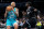 CHARLOTTE, NORTH CAROLINA - DECEMBER 05: P.J. Washington #25 of the Charlotte Hornets drives to the basket while guarded by Reggie Jackson #1 of the LA Clippers in the third quarter during their game at Spectrum Center on December 05, 2022 in Charlotte, North Carolina. NOTE TO USER: User expressly acknowledges and agrees that, by downloading and or using this photograph, User is consenting to the terms and conditions of the Getty Images License Agreement. (Photo by Jacob Kupferman/Getty Images)