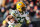 CHICAGO, ILLINOIS - DECEMBER 04: Aaron Jones #33 of the Green Bay Packers runs with the ball against the Chicago Bears at Soldier Field on December 04, 2022 in Chicago, Illinois. (Photo by Michael Reaves/Getty Images)