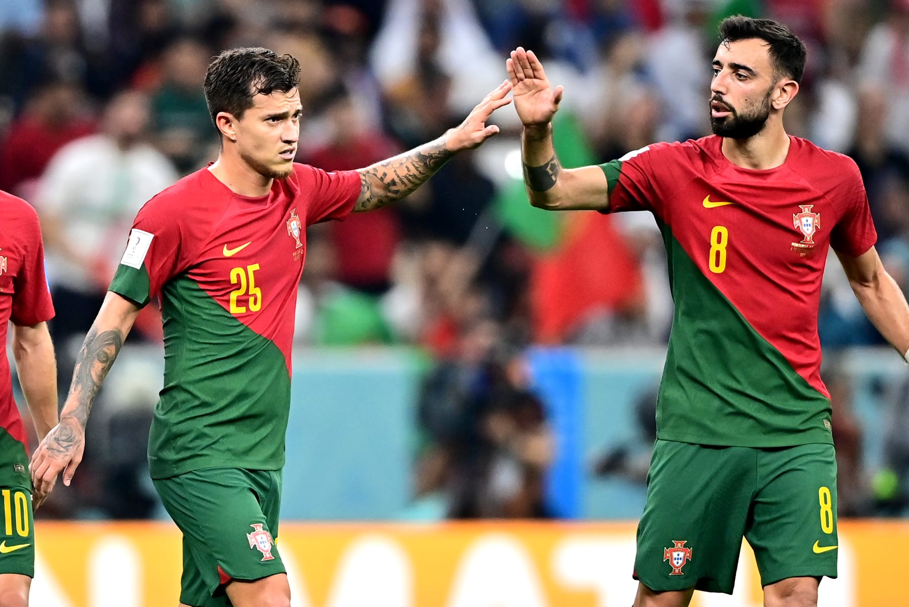 LLUSAIL CITY, QATAR - DECEMBER 06: Otavio and Bruno Fernandes of Portugal celebrates ,during the FIFA World Cup Qatar 2022 Round of 16 match between Portugal and Switzerland at Lusail Stadium on December 6, 2022 in Lusail City, Qatar. (Photo by MB Media/Getty Images)