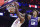 PHILADELPHIA, PENNSYLVANIA - DECEMBER 11: Joel Embiid #21 of the Philadelphia 76ers dunks past Kelly Oubre Jr. #12 of the Charlotte Hornets during the second quarter at Wells Fargo Center on December 11, 2022 in Philadelphia, Pennsylvania. NOTE TO USER: User expressly acknowledges and agrees that, by downloading and or using this photograph, User is consenting to the terms and conditions of the Getty Images License Agreement. (Photo by Tim Nwachukwu/Getty Images)