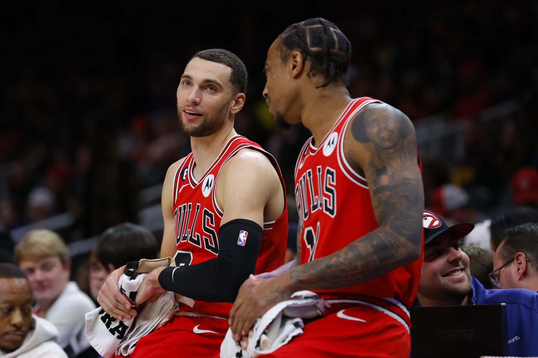 ATLANTA, GA - DECEMBER 11: Zach LaVine #8 speaks with DeMar DeRozan #11 of the Chicago Bulls prior to the game against the Atlanta Hawks at State Farm Arena on December 11, 2022 in Atlanta, Georgia. NOTE TO USER: User expressly acknowledges and agrees that, by downloading and or using this photograph, User is consenting to the terms and conditions of the Getty Images License Agreement. (Photo by Todd Kirkland/Getty Images)