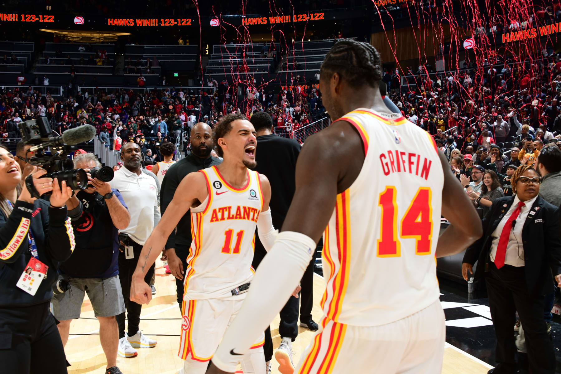 ATLANTA, GA - DECEMBER 11: Trae Young #11 celebrates with AJ Griffin #14 of the Atlanta Hawks who shot the game winner with 0.5 seconds remaining in overtime against the Chicago Bulls on December 11, 2022 at State Farm Arena in Atlanta, Georgia. NOTE TO USER: User expressly acknowledges and agrees that, by downloading and/or using this Photograph, user is consenting to the terms and conditions of the Getty Images License Agreement. Mandatory Copyright Notice: Copyright 2022 NBAE (Photo by Scott Cunningham/NBAE via Getty Images)