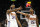 SAN ANTONIO, TX - DECEMBER 4:  Mikal Bridges #25 of the Phoenix Suns celebrates a three against the San Antonio Spurs with Cameron Payne #15 in the first half of the game at AT&T Center on December 4, 2022 in San Antonio, Texas. NOTE TO USER: User expressly acknowledges and agrees that, by downloading and or using this photograph, User is consenting to terms and conditions of the Getty Images License Agreement. (Photo by Ronald Cortes/Getty Images)
