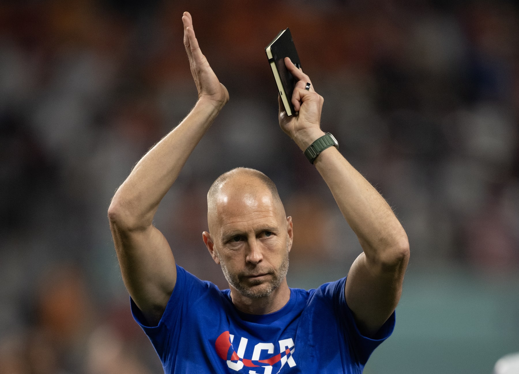 DOHA, QATAR - DECEMBER 03: USA Head Coach Gregg Berhalter applauds the USA fans after defeat in the FIFA World Cup Qatar 2022 Round of 16 match between Netherlands and USA at Khalifa International Stadium on December 03, 2022 in Doha, Qatar. (Photo by Visionhaus/Getty Images)