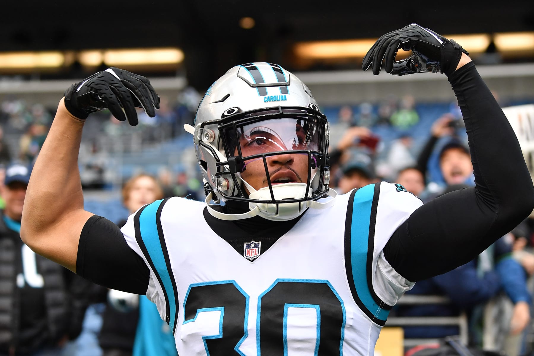 SEATTLE, WASHINGTON - DECEMBER 11: Chuba Hubbard #30 of the Carolina Panthers gestures to the crowd during pregame warmups prior to the game against the Seattle Seahawks at Lumen Field on December 11, 2022 in Seattle, Washington. (Photo by Jane Gershovich/Getty Images)