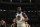 MILWAUKEE, WI - DECEMBER 13: Draymond Green #23 of the Golden State Warriors looks on during the game against the Milwaukee Bucks on December 13, 2022 at the Fiserv Forum Center in Milwaukee, Wisconsin. NOTE TO USER: User expressly acknowledges and agrees that, by downloading and or using this Photograph, user is consenting to the terms and conditions of the Getty Images License Agreement. Mandatory Copyright Notice: Copyright 2022 NBAE (Photo by Gary Dineen/NBAE via Getty Images).