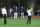 ORLANDO, FLORIDA - DECEMBER 16:  Charlie Woods plays a shot on the first hole as Tiger Woods of the United States looks on during the pro-am prior to the PNC Championship at Ritz-Carlton Golf Club on December 16, 2022 in Orlando, Florida. (Photo by David Cannon/Getty Images)