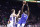 PHILADELPHIA, PENNSYLVANIA - DECEMBER 13: Joel Embiid #21 of the Philadelphia 76ers shots over Domantas Sabonis #10 of the Sacramento Kings during the first quarter at Wells Fargo Center on December 13, 2022 in Philadelphia, Pennsylvania. NOTE TO USER: User expressly acknowledges and agrees that, by downloading and or using this photograph, User is consenting to the terms and conditions of the Getty Images License Agreement. (Photo by Tim Nwachukwu/Getty Images)