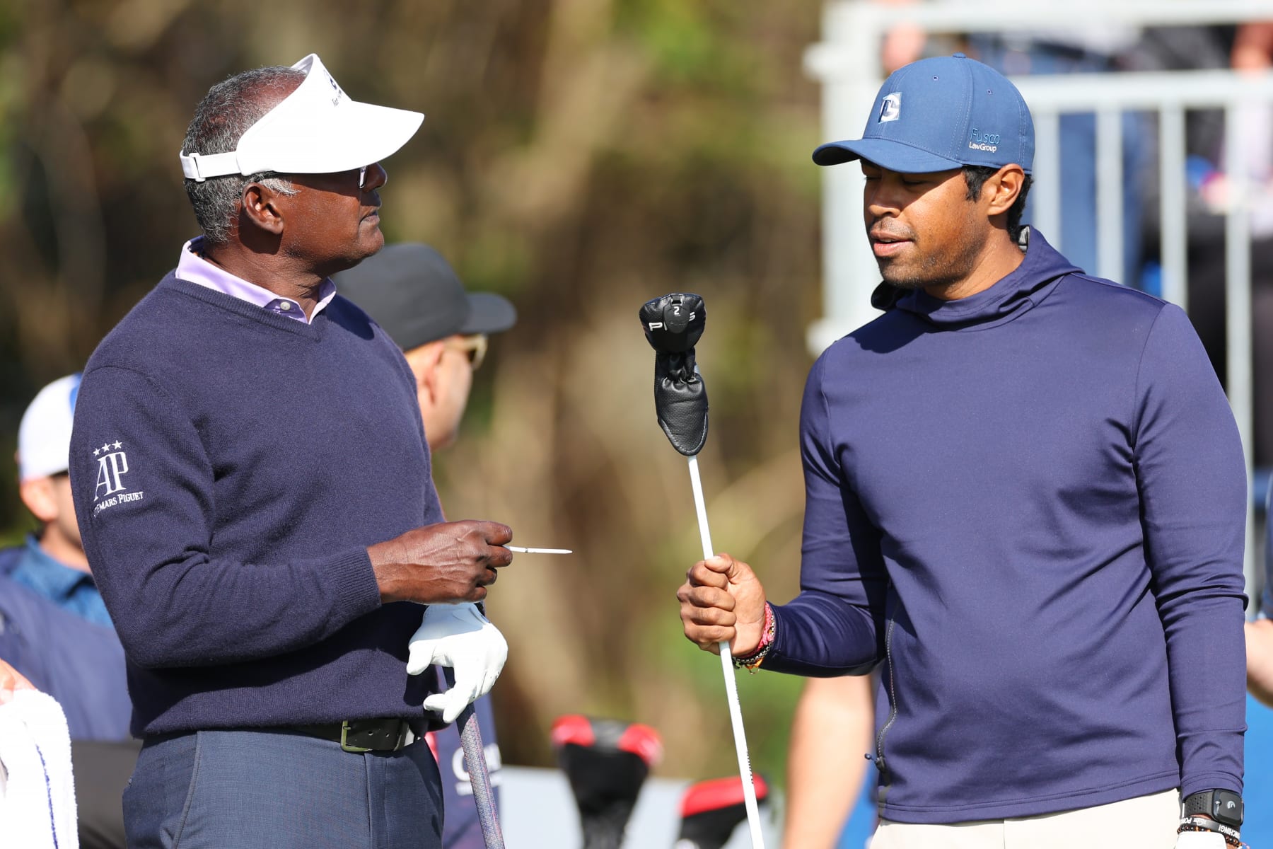 ORLANDO, FLORIDA - DECEMBER 17: Vijay Singh of Fiji and son Qass Singh talk on the first tee during the first round of the PNC Championship at Ritz-Carlton Golf Club on December 17, 2022 in Orlando, Florida. (Photo by Mike Ehrmann/Getty Images)