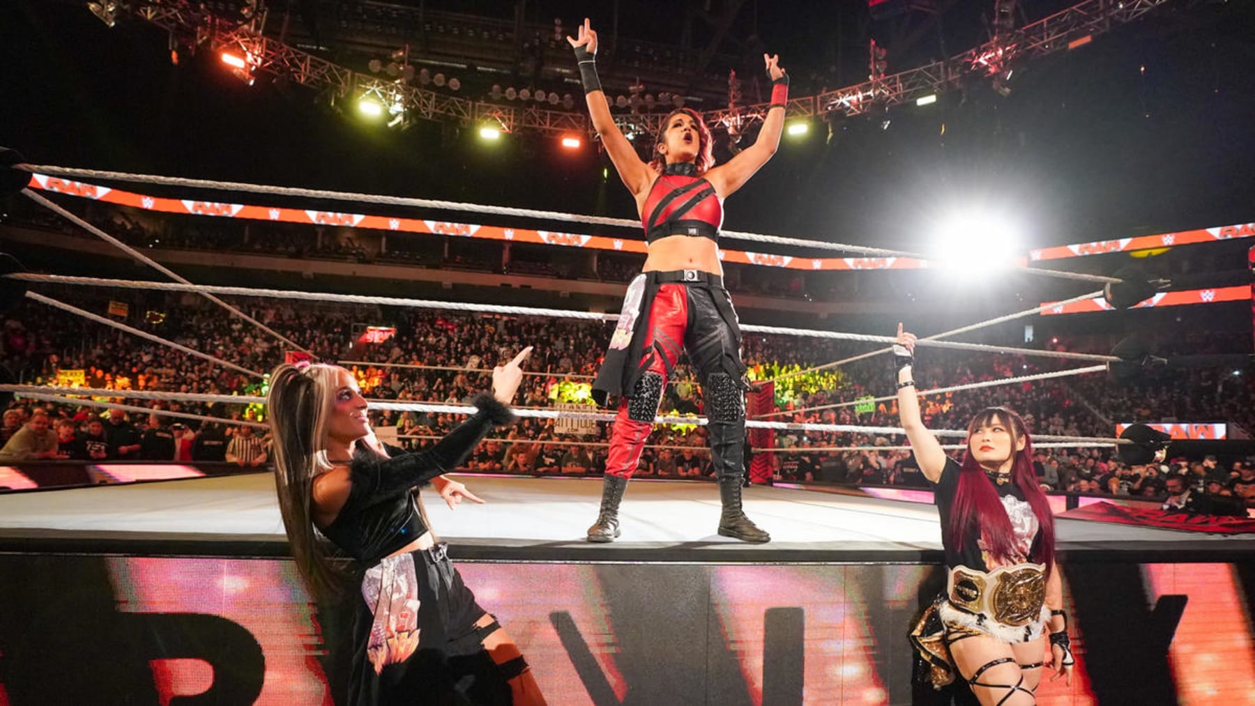 Bayley with Iyo Sky and Dakota Kai.
