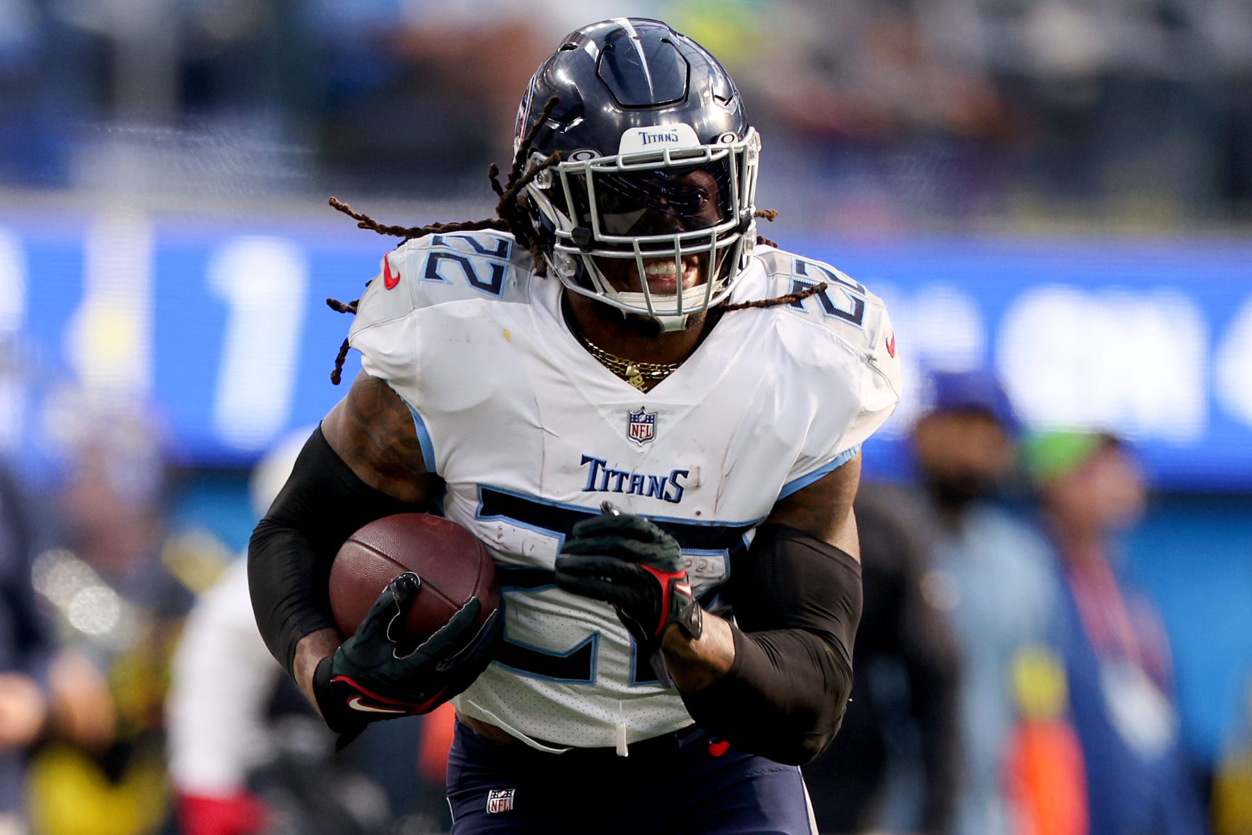 INGLEWOOD, CALIFORNIA - DECEMBER 18: Derrick Henry #22 of the Tennessee Titans runs the ball during the second quarter of the game against the Los Angeles Chargers at SoFi Stadium on December 18, 2022 in Inglewood, California. (Photo by Harry How/Getty Images)