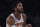 New York Knicks guard Derrick Rose eyes a rebound during an NBA basketball game against the Dallas Mavericks, Saturday, Dec. 3, 2022, in New York. (AP Photo/Bebeto Matthews)