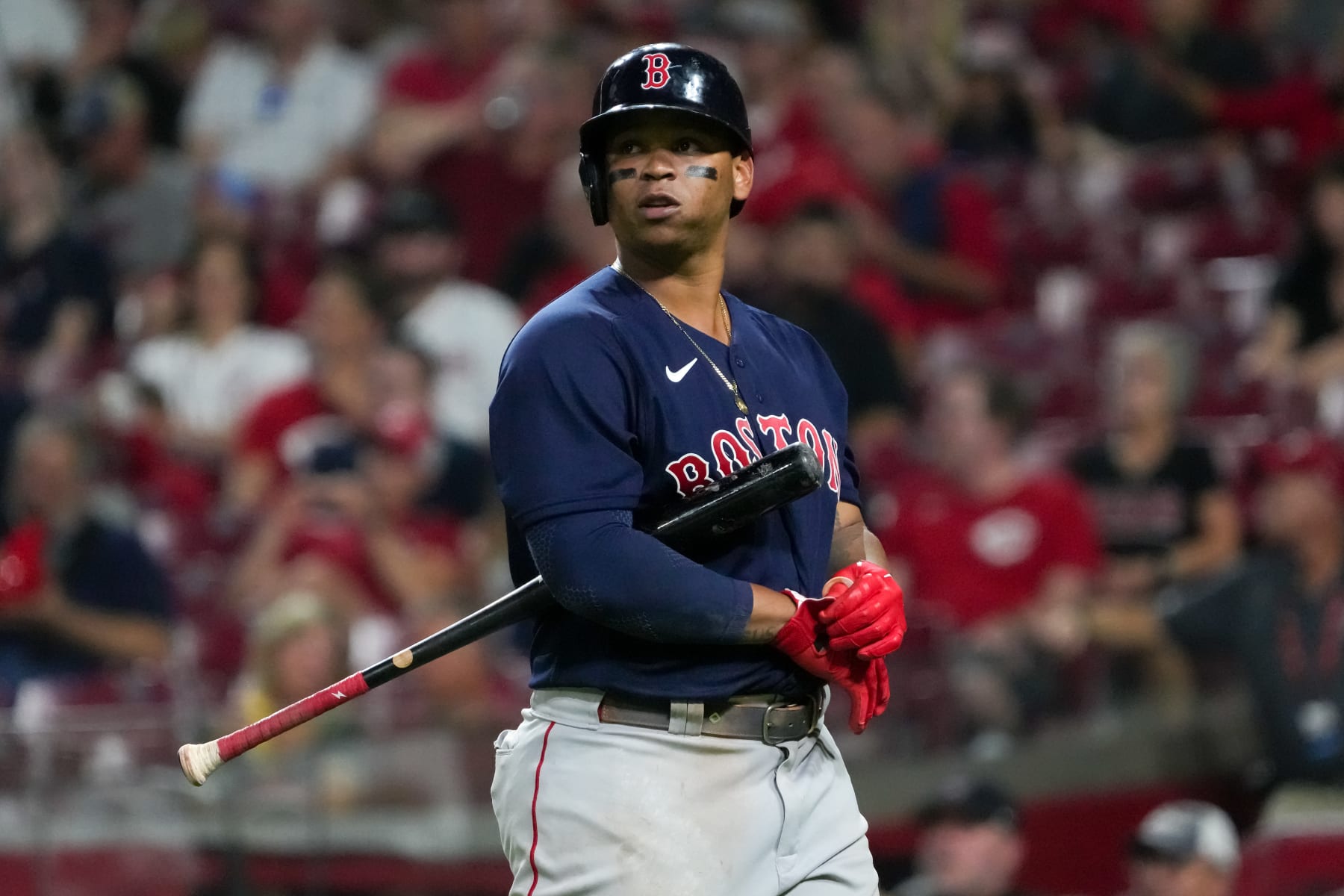 CINCINNATI, OHIO - SEPTEMBER 20: Rafael Devers #11 of the Boston Red Sox walks back to the dugout after striking out in the fifth inning against the Cincinnati Reds at Great American Ball Park on September 20, 2022 in Cincinnati, Ohio. (Photo by Dylan Buell/Getty Images)