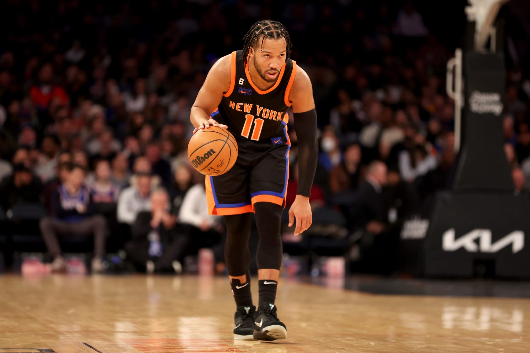 NEW YORK, NEW YORK - DECEMBER 20: Jalen Brunson #11 of the New York Knicks dribbles against the Golden State Warriors during the third quarter of the game at Madison Square Garden on December 20, 2022 in New York City. NOTE TO USER: User expressly acknowledges and agrees that, by downloading and/or using this photograph, User is consenting to the terms and conditions of the Getty Images License Agreement. (Photo by Sarah Stier/Getty Images)