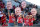 STARKVILLE, MS - OCTOBER 08:  Arkansas Razorbacks fans hold up face cut outs of Arkansas Razorbacks head coach Sam Pittman before the game between the Mississippi State Bulldogs and the Arkansas Razorbacks on October 8, 2022 at Wade Davis Stadium in Starkville, Mississippi. (Photo by Michael Wade/Icon Sportswire via Getty Images)