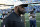CHARLOTTE, NORTH CAROLINA - DECEMBER 18: Head coach Mike Tomlin of the Pittsburgh Steelers walks on the field after their win over the Carolina Panthers at Bank of America Stadium on December 18, 2022 in Charlotte, North Carolina. (Photo by Eakin Howard/Getty Images)