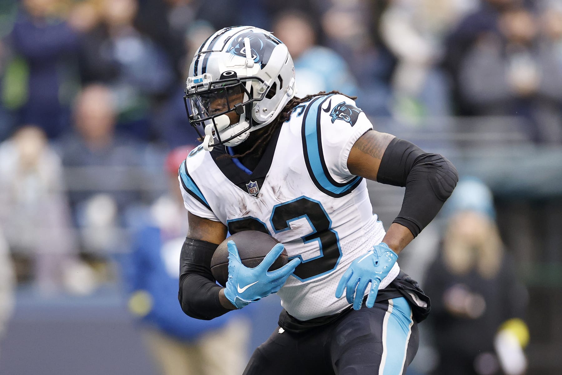 SEATTLE, WASHINGTON - DECEMBER 11: D'Onta Foreman #33 of the Carolina Panthers carries the ball during the second quarter against the Seattle Seahawks at Lumen Field on December 11, 2022 in Seattle, Washington. (Photo by Steph Chambers/Getty Images)