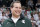 FILE -Former Michigan State player Mat Ishbia laughs as he are introduced along with Michigan State's 2000 national championship NCAA college basketball team during halftime of the Michigan State-Florida game in East Lansing, Mich. Mortgage executive Mat Ishbia has agreed in principle to buy the Phoenix Suns and Phoenix Mercury from the embattled owner Robert Sarver for $4 billion, a person with knowledge of the negotiations told The Associated Press on Tuesday, Dec. 20, 2022. (AP Photo/Al Goldis, File)