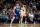 Dallas Mavericks guard Luka Doncic (77) defends Los Angeles Lakers forward LeBron James (6) in the second half of an NBA basketball game in Dallas, Sunday, Dec. 25, 2022. (AP Photo/Emil T. Lippe)