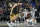 Golden State Warriors guard Klay Thompson, left, reacts next to Memphis Grizzlies forward Dillon Brooks after scoring during the second half of an NBA basketball game in San Francisco, Sunday, Dec. 25, 2022. (AP Photo/Godofredo A. Vásquez)