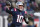 New England Patriots quarterback Mac Jones (10) throws a pass during the second half of an NFL football game, Saturday, Dec. 24, 2022, in Foxborough, Mass. (AP Photo/Charles Krupa)