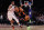 NEW YORK, NEW YORK - DECEMBER 25: Jalen Brunson #11 of the New York Knicks is guarded by De'Anthony Melton #8 of the Philadelphia 76ers during the third quarter of the game at Madison Square Garden on December 25, 2022 in New York City.  NOTE TO USER: User expressly acknowledges and agrees that, by downloading and or using this photograph, User is consenting to the terms and conditions of the Getty Images License Agreement. (Photo by Dustin Satloff/Getty Images)