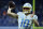 INDIANAPOLIS, INDIANA - DECEMBER 26: Justin Herbert #10 of the Los Angeles Chargers warms up prior to playing the Indianapolis Colts at Lucas Oil Stadium on December 26, 2022 in Indianapolis, Indiana. (Photo by Michael Hickey/Getty Images)