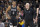 San Antonio Spurs forward Keldon Johnson (3) talks with coach Gregg Popovich during the first half of the team's NBA basketball game against the Los Angeles Clippers, Friday, Nov. 4, 2022, in San Antonio. (AP Photo/Nick Wagner)