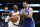 DALLAS, TEXAS - DECEMBER 27:  RJ Barrett #9 of the New York Knicks drives to the basket against Luka Doncic #77 of the Dallas Mavericks in the first half at American Airlines Center on December 27, 2022 in Dallas, Texas. NOTE TO USER: User expressly acknowledges and agrees that, by downloading and or using this photograph, User is consenting to the terms and conditions of the Getty Images License Agreement.  (Photo by Tim Heitman/Getty Images)