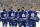 TORONTO , ON - JANUARY 1:  The Toronto Maple Leafs stand for the singing of the national anthem before action against the Detroit Red Wings during NHL game action during the 2014 Bridgestone NHL Winter Classic January 1, 2014 at Michigan Stadium in Ann Arbor, Michigan.  (Photo by Graig Abel/NHLI via Getty Images)