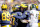 ANN ARBOR, MICHIGAN - SEPTEMBER 03: Donovan Edwards #7 of the Michigan Wolverines and J.J. McCarthy #9 of the Michigan Wolverines embrace after McCarthy scored a touchdown against the Colorado State Rams during the second half at Michigan Stadium on September 03, 2022 in Ann Arbor, Michigan. (Photo by Nic Antaya/Getty Images)