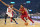 CLEVELAND, OHIO - JANUARY 02: Donovan Mitchell #45 of the Cleveland Cavaliers drives to the basket around Ayo Dosunmu #12 of the Chicago Bulls during the first half at Rocket Mortgage Fieldhouse on January 02, 2023 in Cleveland, Ohio. NOTE TO USER: User expressly acknowledges and agrees that, by downloading and or using this photograph, User is consenting to the terms and conditions of the Getty Images License Agreement. (Photo by Jason Miller/Getty Images)