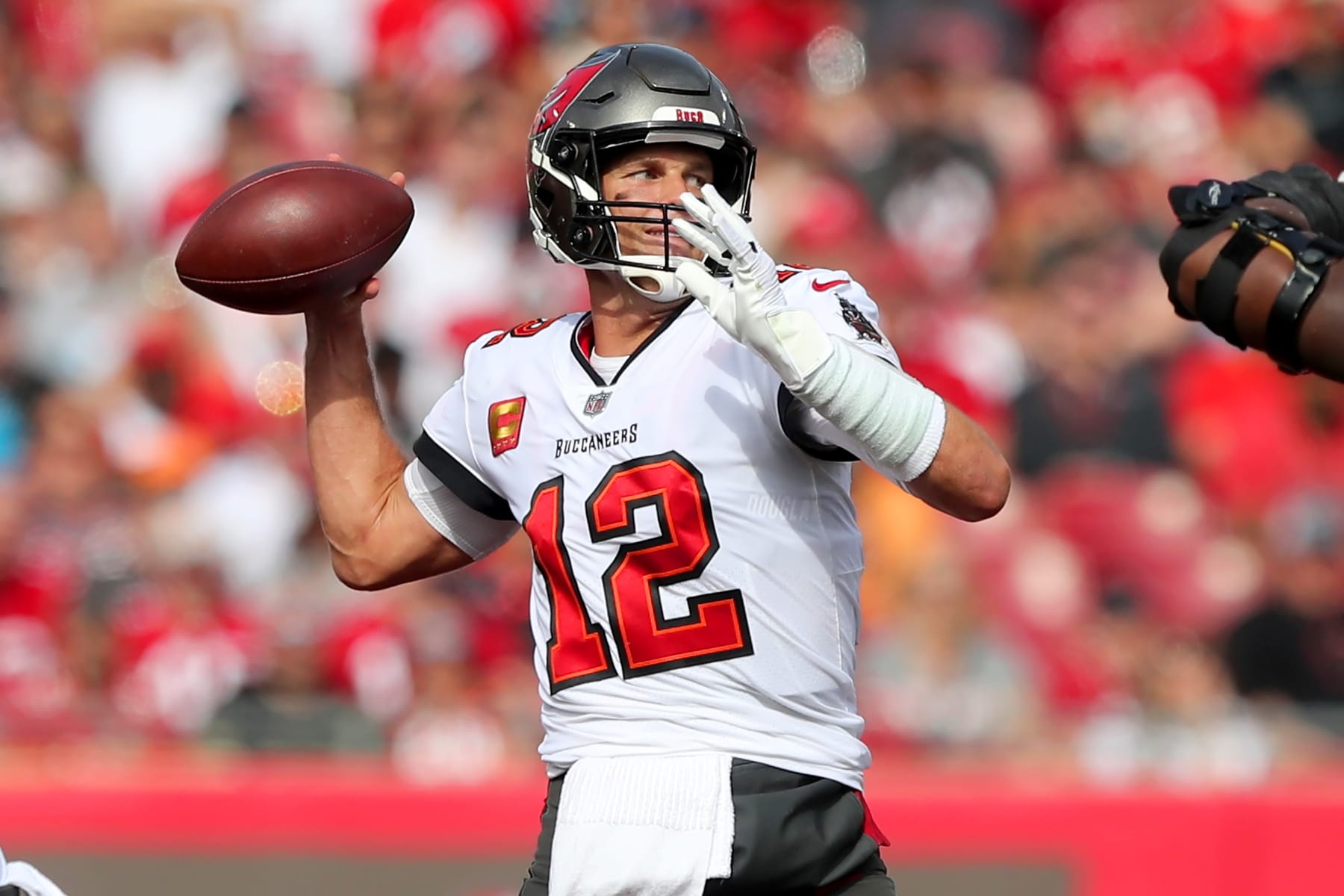 TAMPA, FL - JANUARY 01: Tampa Bay Buccaneers quarterback Tom Brady (12) throws a pass during the regular season game between the Carolina Panthers and the Tampa Bay Buccaneers on January 01, 2023 at Raymond James Stadium in Tampa, Florida. (Photo by Cliff Welch/Icon Sportswire via Getty Images)