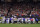 CINCINNATI, OHIO - JANUARY 02: Buffalo Bills players huddle and pray after teammate Damar Hamlin #3 collapsed on the field after making a tackle against the Cincinnati Bengals during the first quarter at Paycor Stadium on January 02, 2023 in Cincinnati, Ohio. (Photo by Dylan Buell/Getty Images)