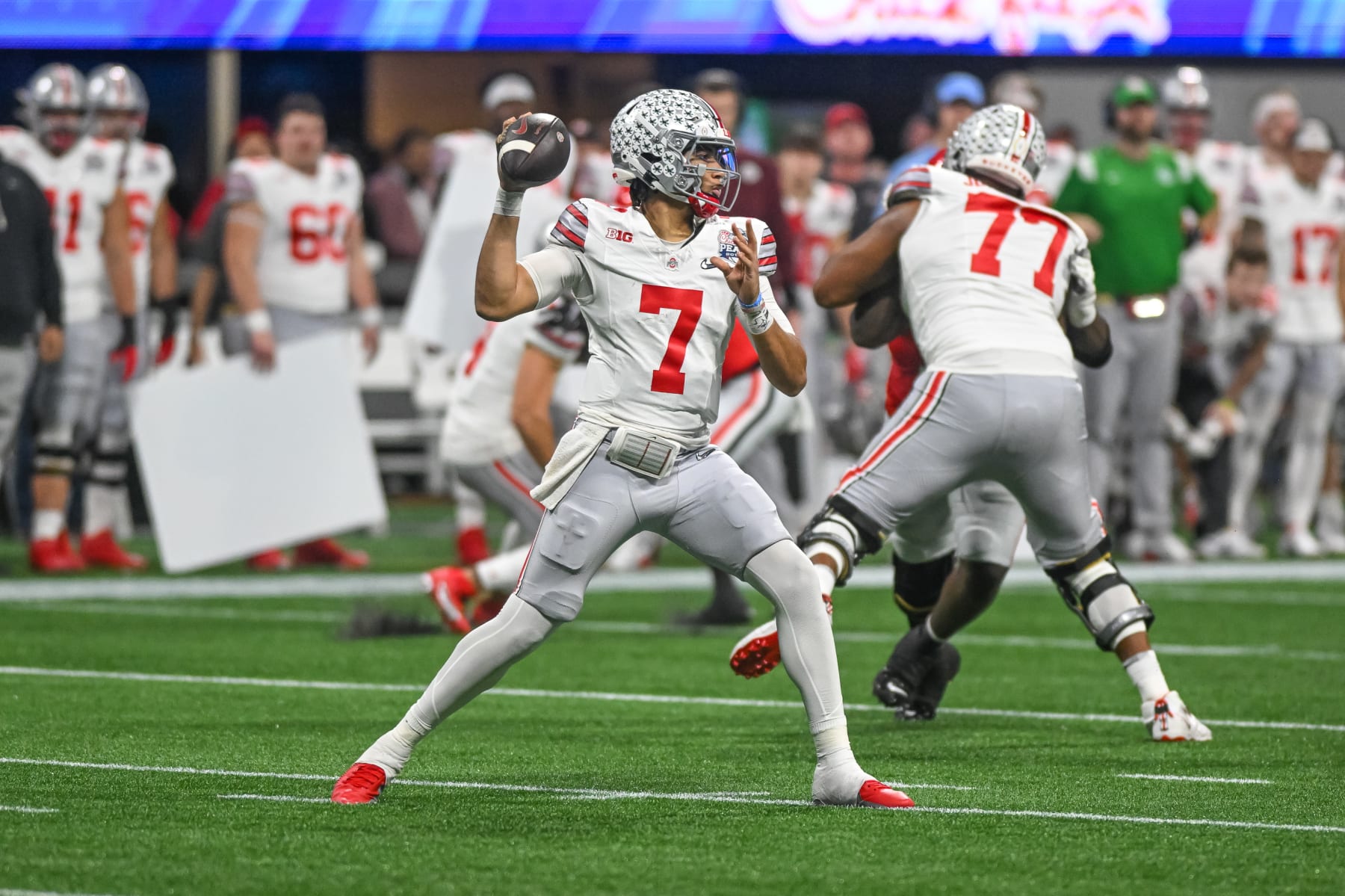 ATLANTA, GA - DECEMBER 31: Ohio State Buckeyes quarterback C.J. Stroud (7) during the Chick-fil-A Peach Bowl College Football Playoff Semifinal game between the Ohio State Buckeyes and the Georgia Bulldogs on December 31, 2022, at Mercedes-Benz Stadium in Atlanta, Georgia. (Photo by John Adams/Icon Sportswire via Getty Images)