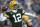 GREEN BAY, WISCONSIN - JANUARY 01: Aaron Rodgers #12 of the Green Bay Packers throws a pass during the first quarter against the Minnesota Vikings at Lambeau Field on January 01, 2023 in Green Bay, Wisconsin. (Photo by Kayla Wolf/Getty Images)