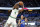 Boston Celtics' Noah Vonleh (4) grabs a rebound in front of Orlando Magic's Cole Anthony (50) during the first half of an NBA basketball game, Saturday, Oct. 22, 2022, in Orlando, Fla. (AP Photo/John Raoux)