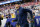 GLENDALE, AZ - DECEMBER 31: Michigan Wolverines head coach Jim Harbaugh runs onto the field before the VRBO Fiesta Bowl college football national championship semifinal game between the Michigan Wolverines and the TCU Horned Frogs on December 31, 2022 at State Farm Stadium in Glendale, Arizona. (Photo by Kevin Abele/Icon Sportswire via Getty Images)