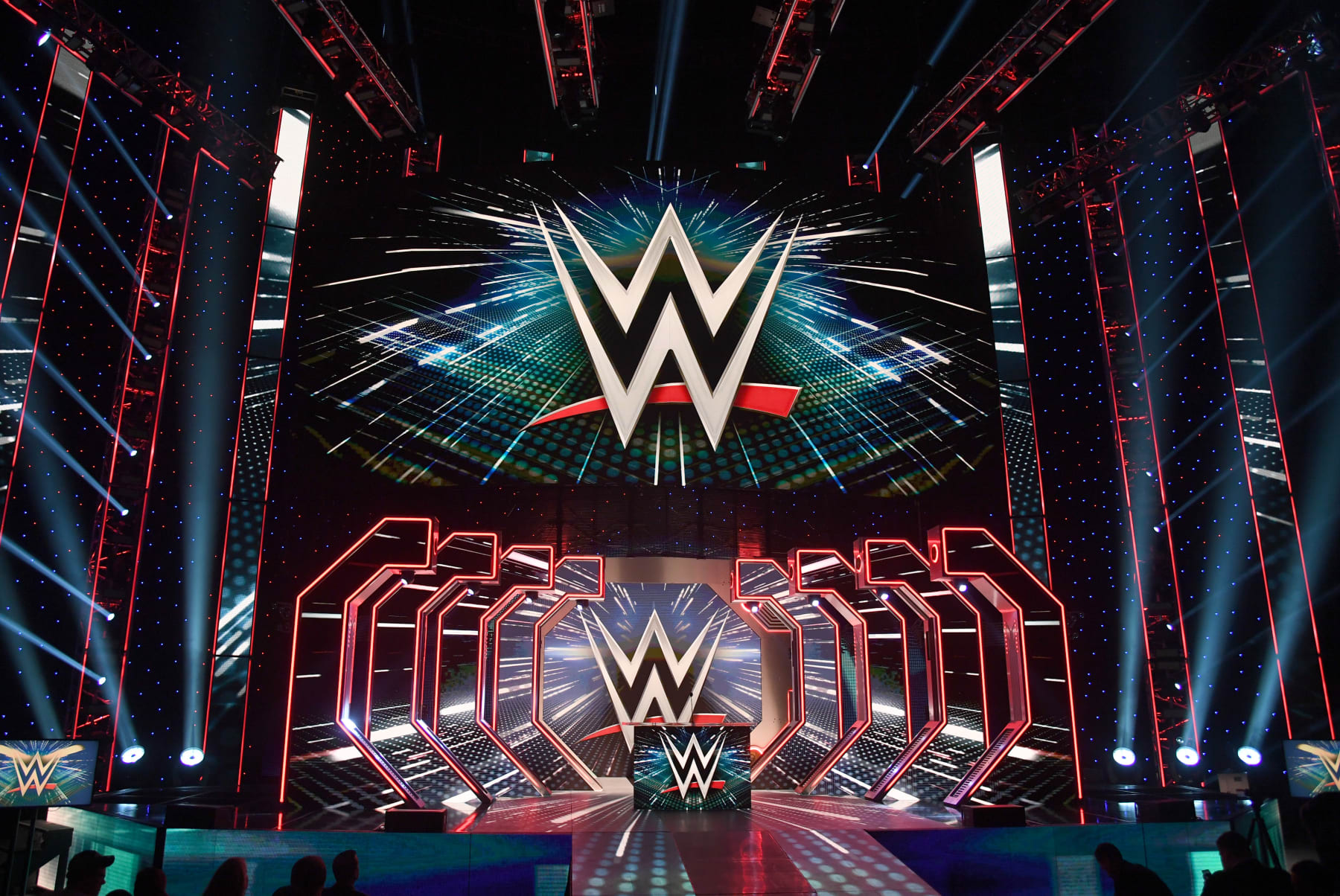LAS VEGAS, NEVADA - OCTOBER 11: WWE logos are shown on screens before a WWE news conference at T-Mobile Arena on October 11, 2019 in Las Vegas, Nevada. It was announced that WWE wrestler Braun Strowman will face heavyweight boxer Tyson Fury and WWE champion Brock Lesnar will take on former UFC heavyweight champion Cain Velasquez at the WWE's Crown Jewel event at Fahd International Stadium in Riyadh, Saudi Arabia on October 31. (Photo by Ethan Miller/Getty Images)